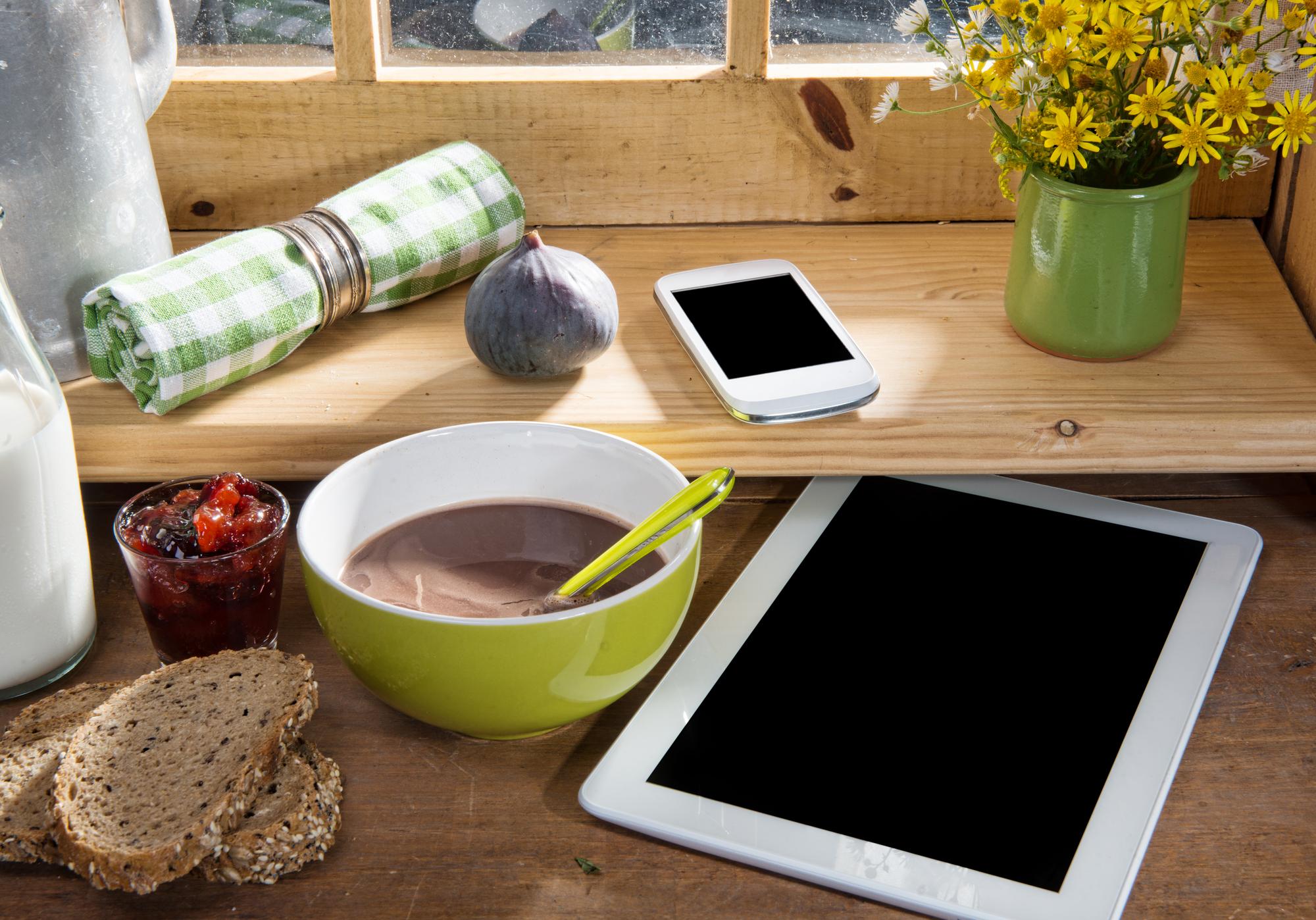Compact test kitchen workspace with utensils and tablet
